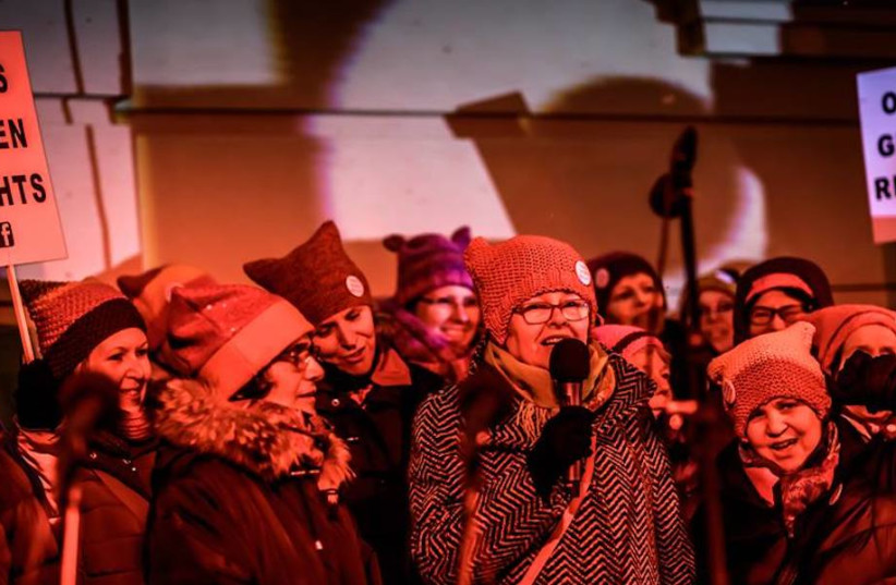  Monika Salzer speaks at a rally with fellow members of the Omas Gegen Rechts group, or Grandmas Against The Right, which she co-founded in 2017.  (photo credit: OMAS GEGEN RECHTS VIA JTA)