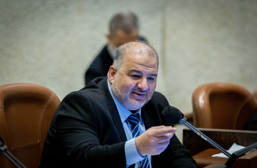 MK Mansour Abbas during a discussion on the Electricity Law connecting to Arab and Bedouin towns, during a plenum session in the assembly hall of the Israeli parliament in Jerusalem, January 5, 2022.  (credit: YONATAN SINDEL/FLASH 90)