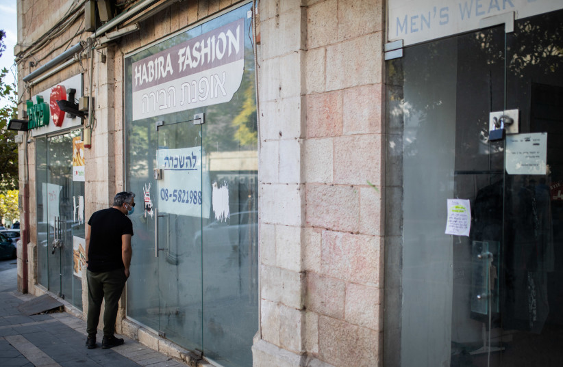  A STORE stands empty in Tel Aviv. (credit: HADAS PARUSH/FLASH90)