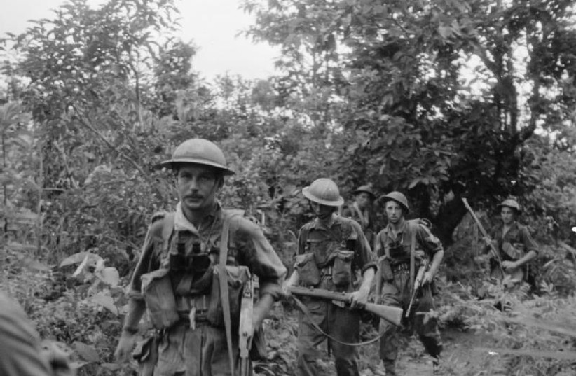  ROYAL WELSH Fusiliers, 36th Infantry Division of the British Army, move forward on a jungle path near Pinbaw, Burma, 1944. (photo credit: PICRYL)