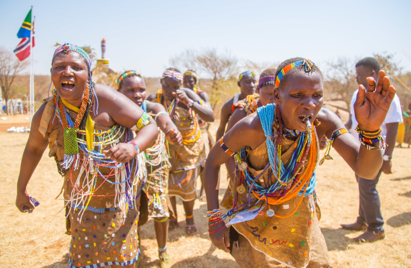  Members of the Hadza, a modern hunter-gatherer people living in northern Tanzania, singing and dancing (photo credit: Wikimedia Commons)