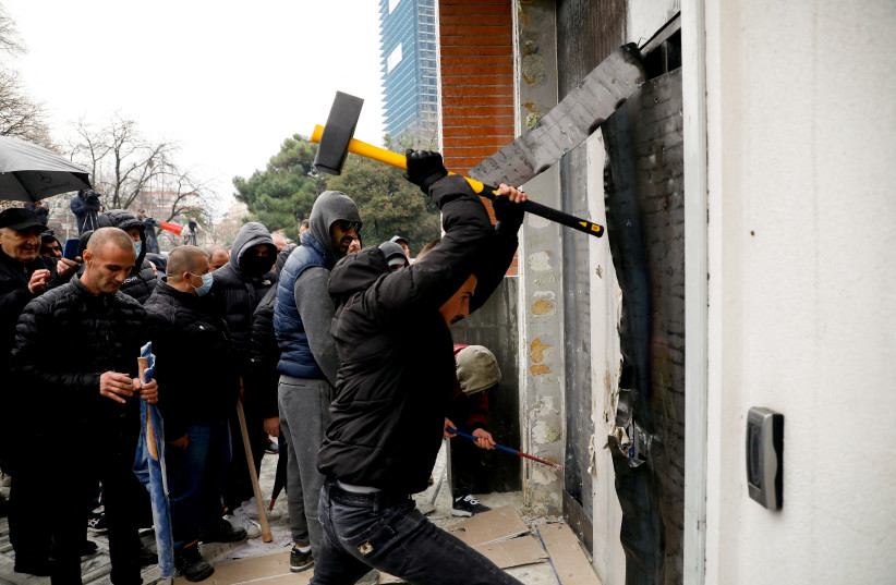  Protesters attack the headquarters of the Democratic Party in Tirana, Albania, January 8, 2022. (credit: REUTERS/FLORION GOGA)