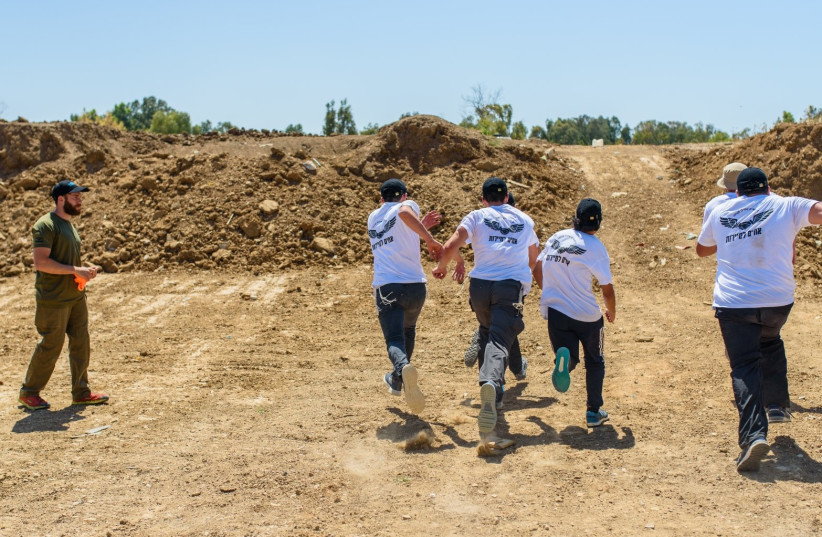   Haredi youth are seen training in the IDF's Achim Lasayarot program. (credit: Yossi Sabah)