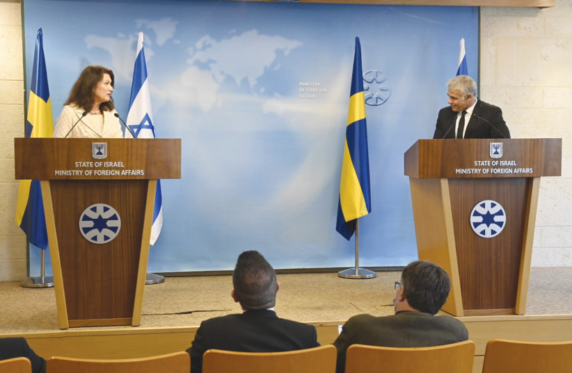  FOREIGN MINISTER Yair Lapid and Swedish Foreign Minister Ann Linde address the media in Jerusalem during a visit by Linde in October. (photo credit: Jorge Novominsky)
