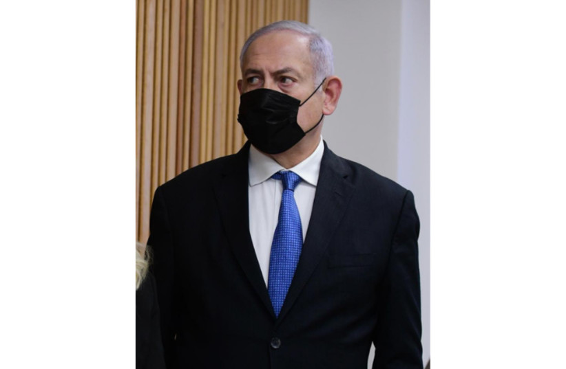  Former prime minister Benjamin Netanyahu at defamation lawsuit against former prime minister Ehud Olmert, January 10, 2021.  (credit: AVSHALOM SASSONI/MAARIV)