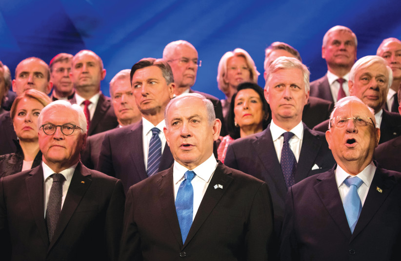 GERMAN PRESIDENT Frank-Walter Steinmeier, then-prime minister Benjamin Netanyahu and then-president Reuven Rivlin stand with world leaders at the Fifth World Holocaust Forum at Yad Vashem in 2020. (photo credit: YONATAN SINDEL/FLASH90)