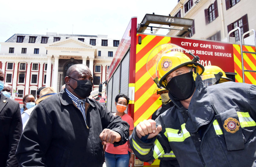  South African President Ramaphosa inspects damages after fire broke out at Parliament building in Cape Town. (photo credit: REUTERS)