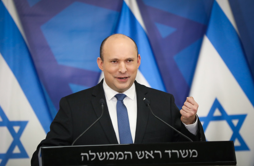Prime Minister Naftali Bennett in a press conference on January 11, 2022 (photo credit: NOAM RIVKIN-PANTON/FLASH90)