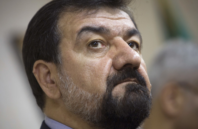  Secretary of the Expediency Council arbitration body and Iran's upcoming presidential election candidate Mohsen Rezai attends a news conference at the Iranian Mehr news agency office in Tehran, May 24, 2009. (photo credit: REUTERS/MORTEZA NIKOUBAZL)