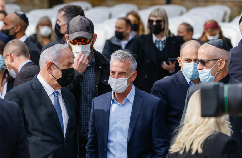 Mossad chief David Barnea (center) at the funeral of Aura Herzog, wife of late Israeli president Chaim Herzog, and mother of current Israeli president Isaac Herzog on January 12, 2022 (photo credit: OLIVIER FITOUSSI/FLASH90)
