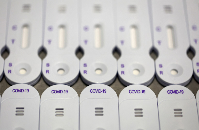  COVID-19 tests are pictured at the NG Biotech factory in Guipry-Messac as France experiences a surge in coronavirus disease (COVID-19) cases due to the Omicron variant, France, January 12, 2022. (credit: REUTERS/STEPHANE MAHE)