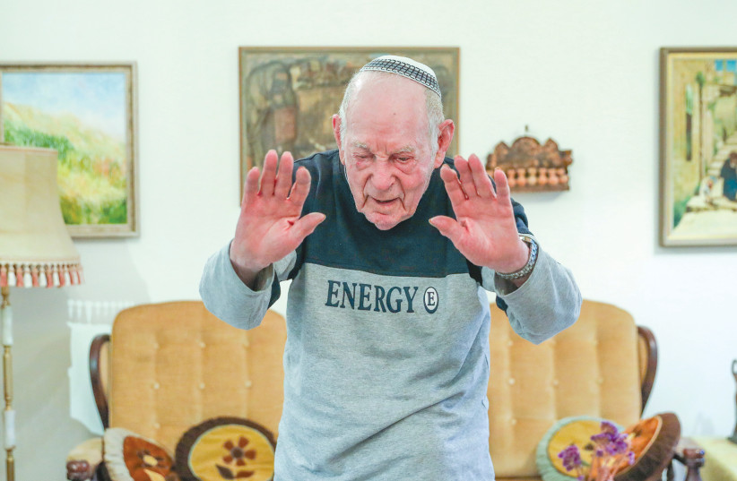  Shmuel Mikulincer demonstrates his exercise routine. (credit: MARC ISRAEL SELLEM)