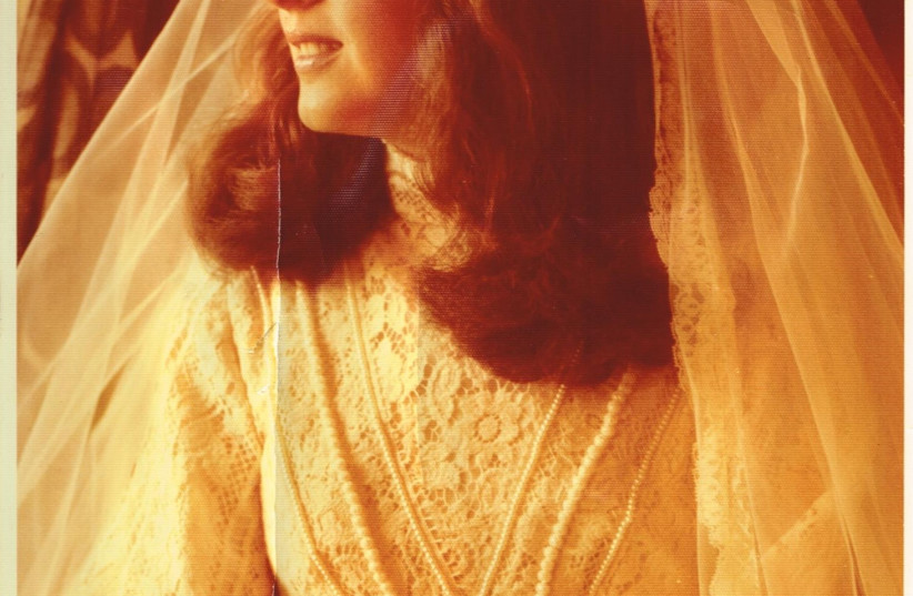  The writer in her wedding gown. (photo credit: MOSHE CAINE)