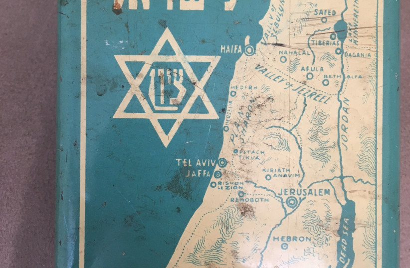  THE WRITER’S blue box, the iconic KKL-JNF ‘pushke’ raising money for the Zionist dream. (credit: COURTESY AVIE GEFFEN)