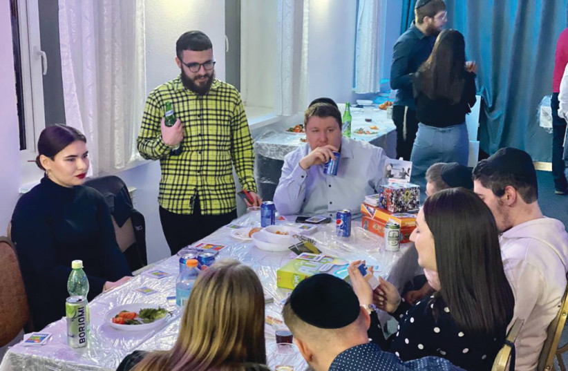  YOUNG RELIGIOUS Jews, several from Donetsk and the east, at Vishetsky’s Chabad community center in Kyiv. Few are considering aliyah at this time. (credit: JON IMMANUEL)