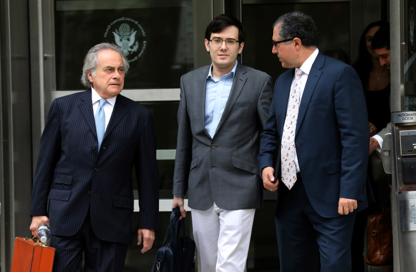 Former drug company executive Martin Shkreli (C) exits U.S. District Court in the Brooklyn borough of New York City, U.S., July 28, 2017, with his lead attorney Benjamin Brafman (L). (credit: REUTERS/MIKE SEGAR)