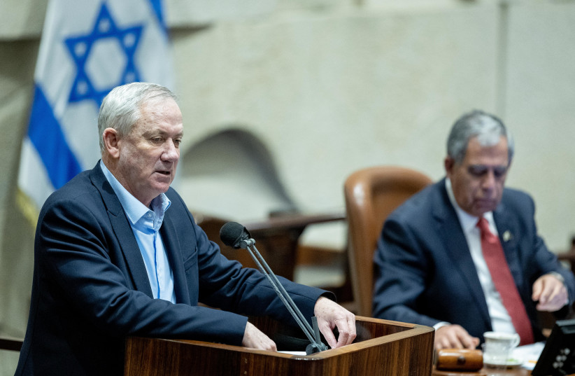  Minister of Defense Benny Gantz speaks during a vote on the ultra-Orthodox draft bill, at the Knesset, the Israeli parliament in Jerusalem, January 17, 2022. (credit: YONATAN SINDEL/FLASH90)