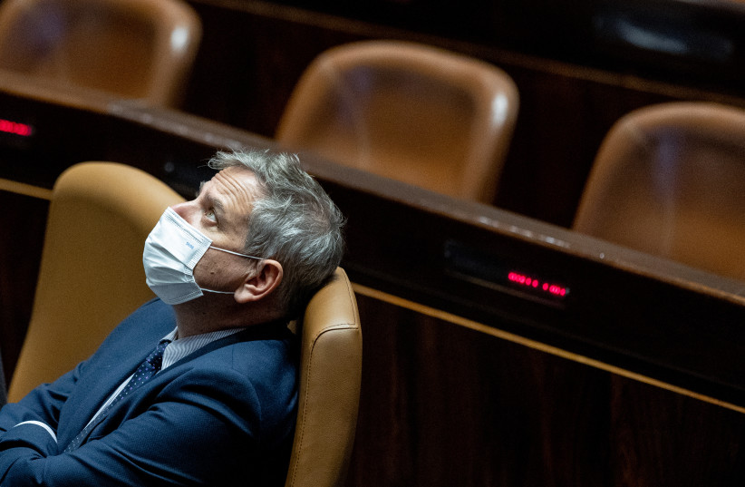 Health Minister Nitzan Horowitz attends a plenum session for the 73rd establishment of the Knesset,  in the assembly hall of the Israeli parliament in Jerusalem, January 17, 2022. (credit: YONATAN SINDEL/FLASH90)