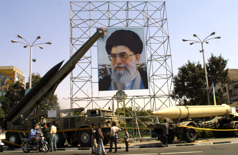  The Iranian military displays missles at Tehran's Baharestan square to commemorate the 1980-88 Iran-Iraq war during ''sacred defense week'' September 25, 2003. (credit: MORTEZA NIKOUBAZI/ REUTERS)