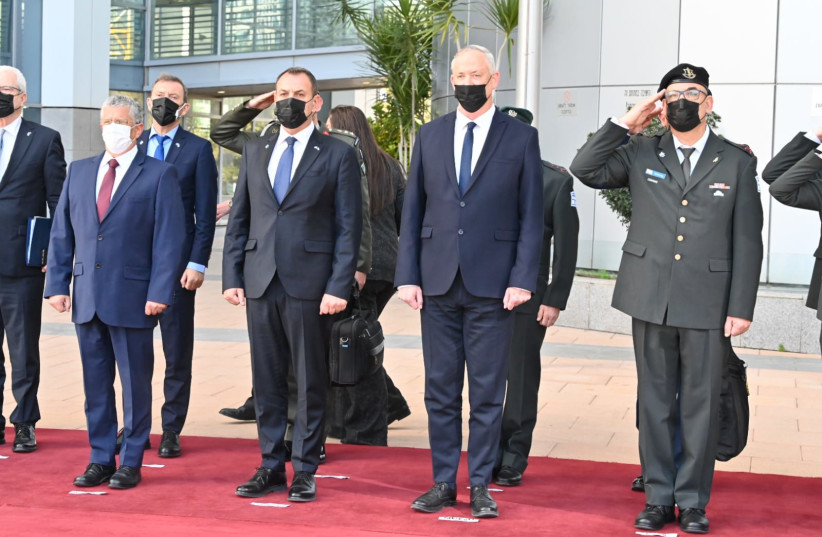   Defense Minister Benny Gatnz with Greek counterpart Nikolaos Panagiotopoulos during the latter's visit to Israel on January 20, 2022 (credit: DEFENSE MINISTRY)