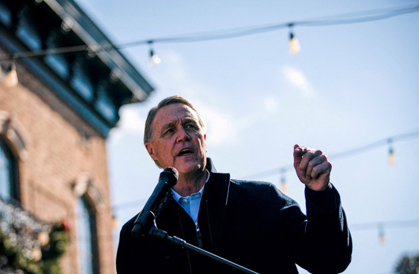 Then-Senator David Perdue (R-GA) speaks during a campaign event as he runs for re-election at the Olde Blind Dog Irish Pub, in Milton, Georgia, US, December 21, 2020. (credit: REUTERS/AL DRAGO/FILE PHOTO)