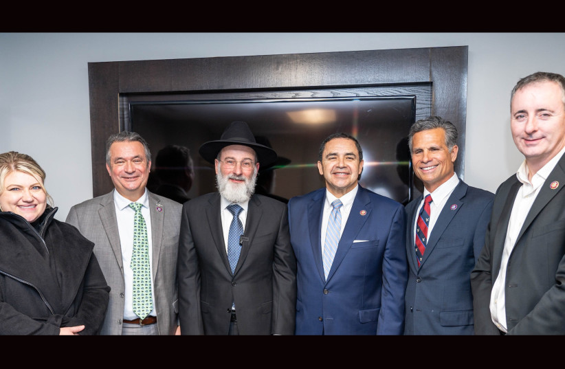  The inauguration of the Congressional Caucus for the Advancement of Torah Values was attended by, from left to right, Rep. Kat Cammack; Rep. Don Bacon; Rabbi Dovid Hofstedter; Rep. Henry Cuellar; Rep. Dan Meuser; and Rep. Brian Fitzpatrick in Washington, D.C.  (photo credit: Sruly Saftlas/CNW Group/Dirshu)
