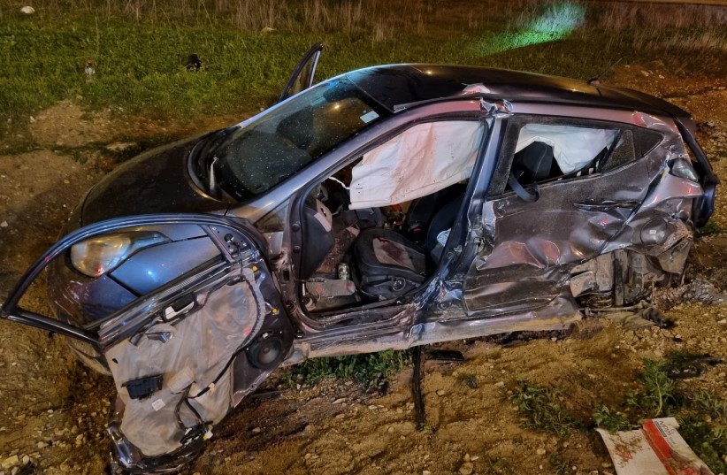 A smashed car following the accident near Tidhar Junction in the Negev on January 21, 2022 (photo credit: FIRE AND RESCUE SERVICE)