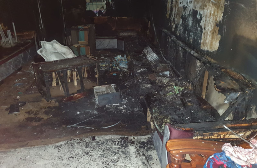 Nine injured in east Jerusalem apartment fire. (photo credit: JERUSALEM FIRE AND RESCUE SERVICES)
