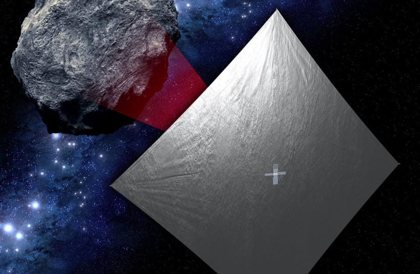  Artist's depiction of the NASA's NEA Scout using a solar sail to approach asteroid 2020 GE after being launched during the Artemis I mission. (photo credit: NASA)