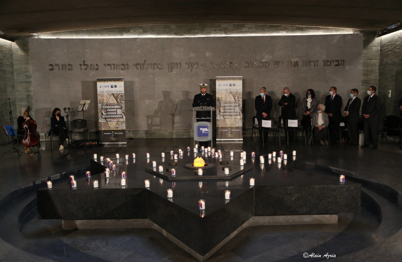  A cantor sings the Kaddish at a ceremony in Paris marking 80 years since the Wannsee Conference, on January 20, 2022. (photo credit: ALAIN AZRIA)