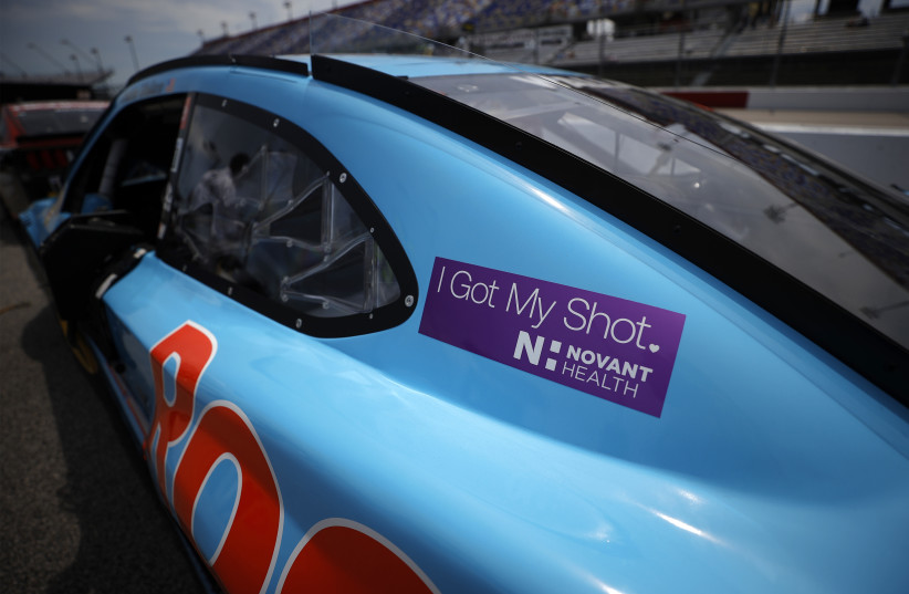  DARLINGTON, SOUTH CAROLINA - MAY 09: A detail of a Novant Health sticker "I Got My Shot" on the #23 Root Insurance Toyota, driven by Bubba Wallace sits on the grid prior to the NASCAR Cup Series Goodyear 400 at Darlington Raceway on May 09, 2021 in Darlington, South Carolina.  (photo credit: Chris Graythen/Getty Images)