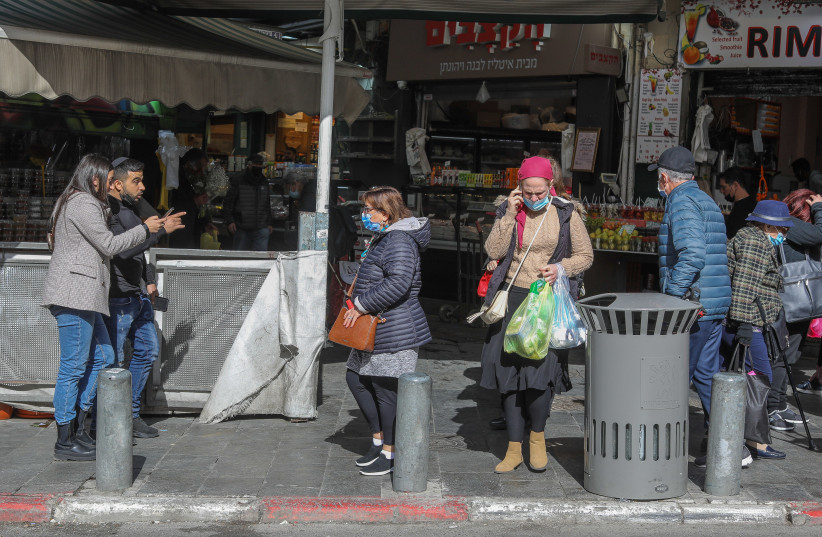  Jerusalem's Mahaneh Yehuda Market is a popular destination for tourists  (credit: MARC ISRAEL SELLEM)