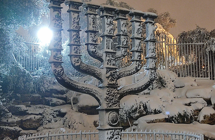  The snow-covered Knesset Menorah. (photo credit: ARIK BENDER/MAARIV)