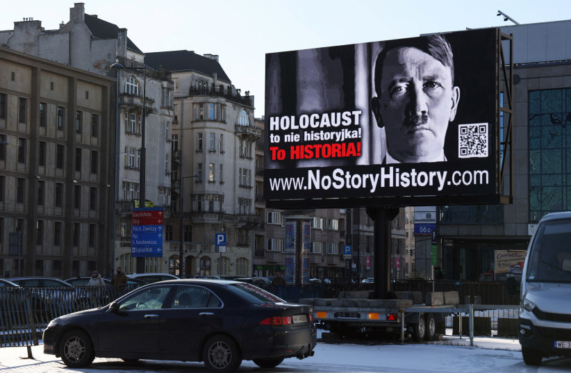  A campaign poster depicting Adolf Hitler is displayed in central Warsaw. Campaign by Chasdei Naomi, an Israeli welfare association which supports thousands of Holocaust survivors in Warsaw, Poland January 23, 2022 (photo credit: REUTERS/KACPER PEMPEL)