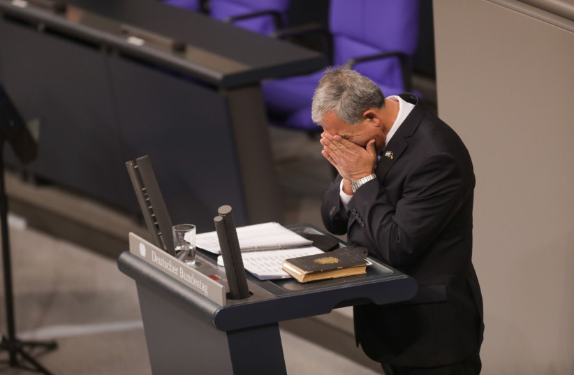  Knesset Speaker Mickey Levy breaking down at the Bundestag in Berlin during his speech on International Holocaust Remembrance Day, January 27, 2022.  (credit: BOAZ ARAD)