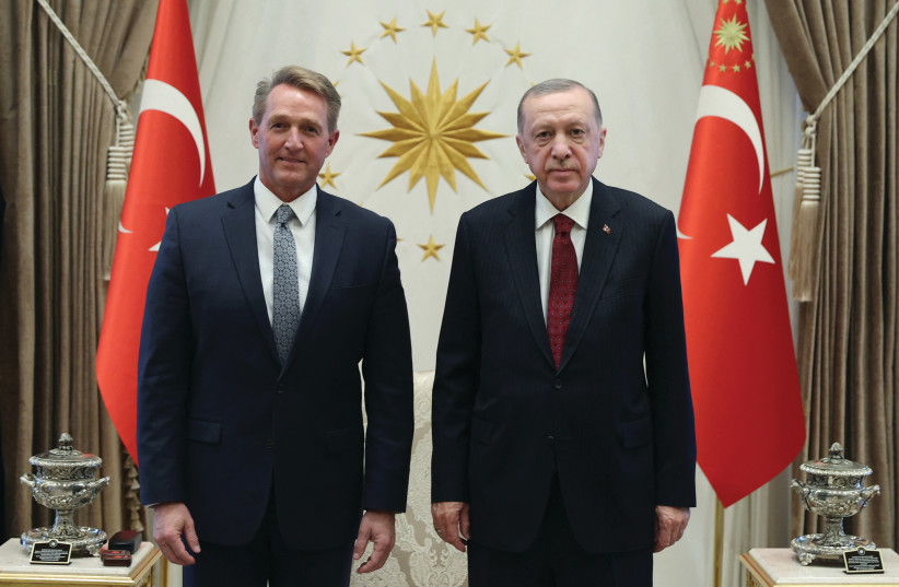  TURKISH PRESIDENT Recep Tayyip Erdogan meets with new US Ambassador to Turkey Jeff Flake at the Presidential Palace in Ankara last week.  (credit: PRESIDENTIAL PRESS OFFICE/HANDOUT VIA REUTERS)