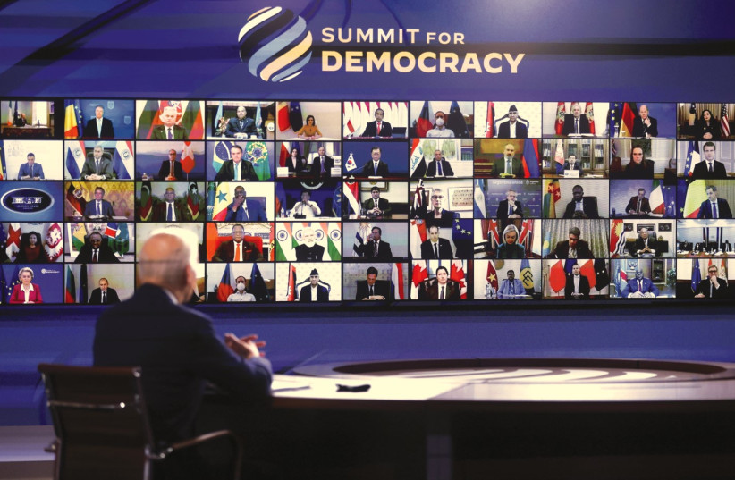 US PRESIDENT Joe Biden convenes a virtual Summit for Democracy from the White House in December. (photo credit: LEAH MILLIS/REUTERS)