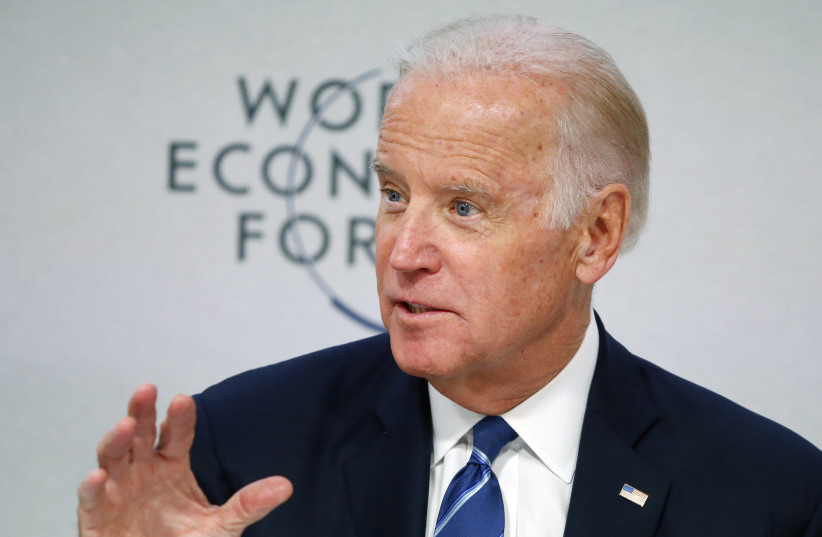 US Vice President Joe Biden addresses the session "Cancer Moonshot: A Call to Action" during the annual meeting of the World Economic Forum (WEF) in Davos, Switzerland, January 19, 2016. (photo credit: REUTERS/RUBEN SPRICH)