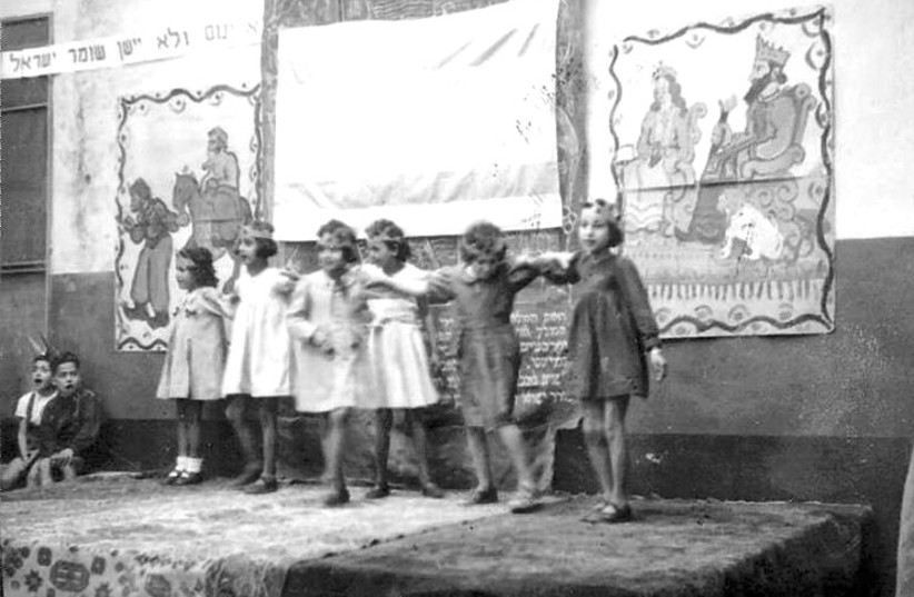  CHILDREN put on a presentation at a Jewish school in Benghazi, Libya, in 1944. (photo credit: Diarna Geo-Museum of MENA Jewish Life)