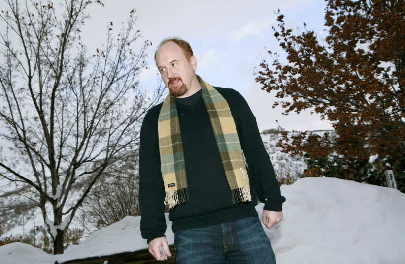  Stand-up comedian and director Louis C.K. poses for a photograph as he arrives for the premiere of his film "Hilarious" at the Sundance Film Festival in Park City, Utah January 26, 2010. (photo credit: REUTERS/ROBERT GALBRAITH)
