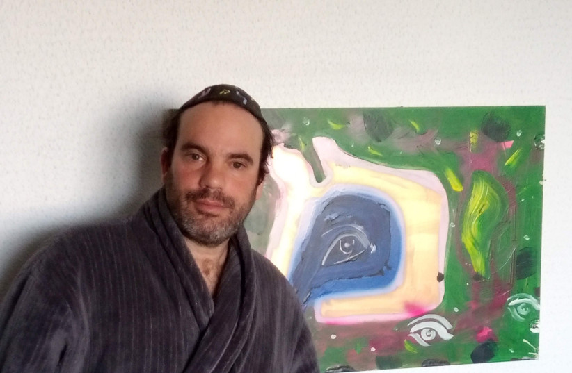  AT HOME, in front of his painting ‘Letter mem-elephant.’ (photo credit: Courtesy Daniel Shorkend)