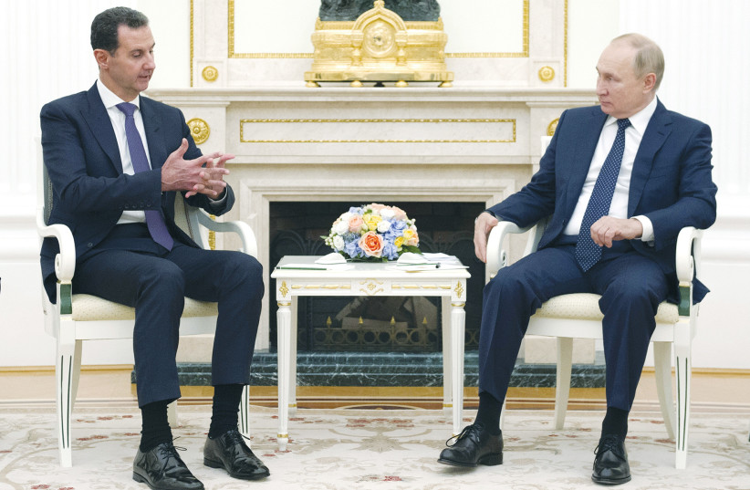  RUSSIAN PRESIDENT Vladimir Putin meets with Syrian President Bashar Assad in Moscow in September. (credit: Sputnik/Kremlin/Reuters)