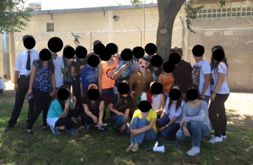 Nevárez's students posing with the HItler Pinata. (credit: Screenshot/Facebook )