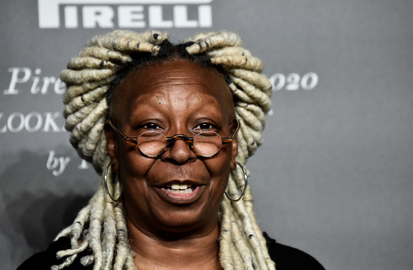  Actor Whoopi Goldberg poses as she arrives at the launch of the "Looking for Juliet" 2020 Pirelli Calendar, in the northern Italian city of Verona, Italy December 3, 2019. (photo credit: REUTERS/FLAVIO LO SCALZO)