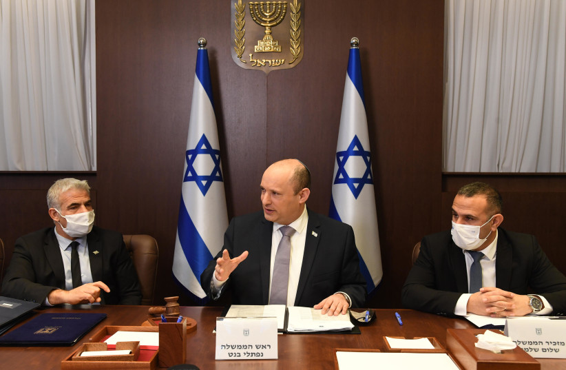  Prime Minister Naftali Bennett at Sunday's cabinet meeting February 6, 2022. (credit: CHAIM TZACH/GPO)