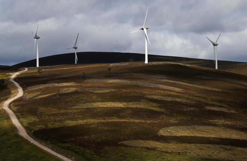  A view of wind turbines on the uplands of Kildrummy Estate, in Kildrummy, Scotland, Britain, September 7, 2021. (photo credit: REUTERS/RUSSELL CHEYNE)