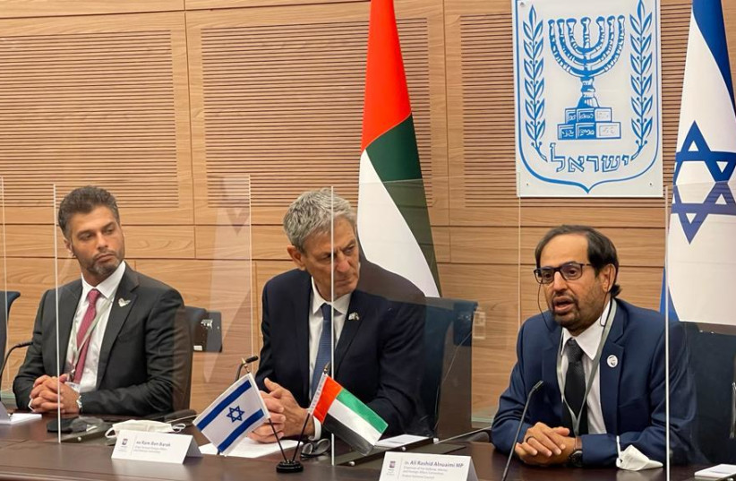  UAE Ambassador to Israel Mohamed Al Khaja, MK Ram Ben-Barak, and Dr. Ali Al Nuaimi, chairman of the Defense Affairs, Interior and Foreign Relations Committee of the UAE Federal National Council, meet at the Knesset in Jerusalem, Feb. 7, 2022. (credit: COURTESY OF DR. ALI'S OFFICE)