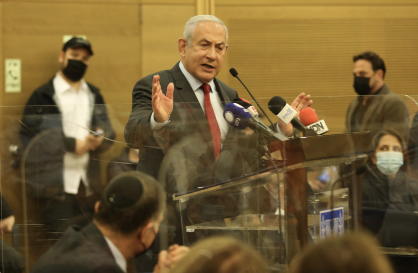  Opposition head Benjamin Netanyahu at the Knesset, February 7, 2022. (photo credit: MARC ISRAEL SELLEM/THE JERUSALEM POST)