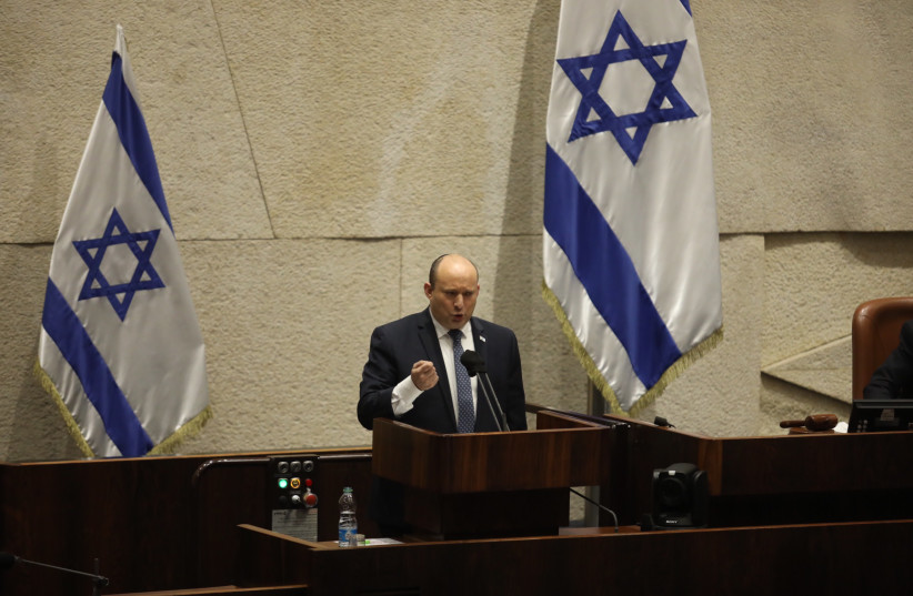  Prime Minister Naftali Bennett in the Knesset plenum, February 7, 2022. (photo credit: MARC ISRAEL SELLEM/THE JERUSALEM POST)