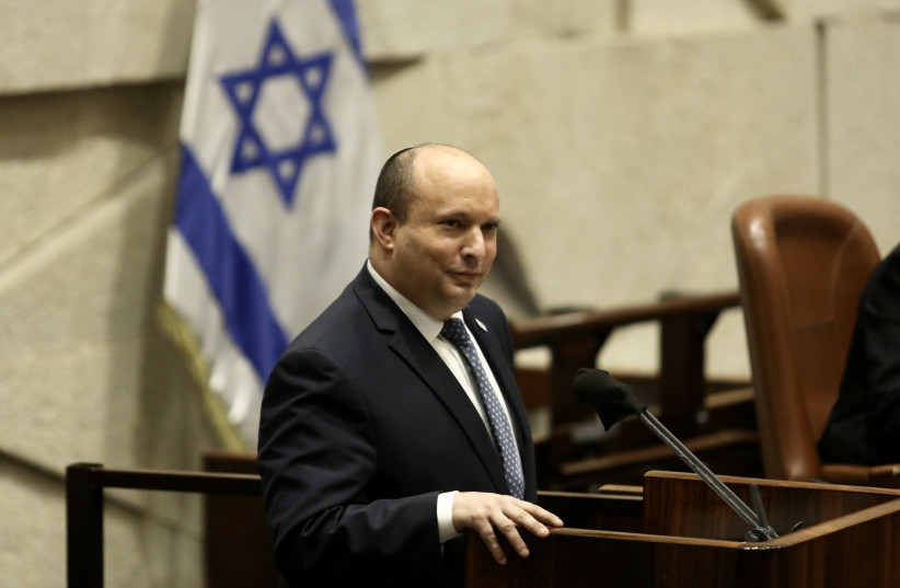   Prime Minister Naftali Bennett in the Knesset plenum, February 7, 2022. (photo credit: MARC ISRAEL SELLEM/THE JERUSALEM POST)